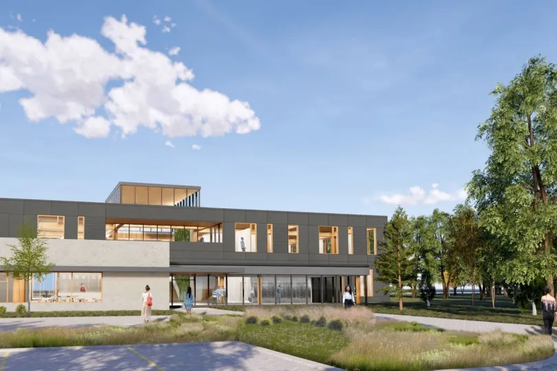 Rendering of the First Nations Technical Institute building with landscaped grounds and people walking outside