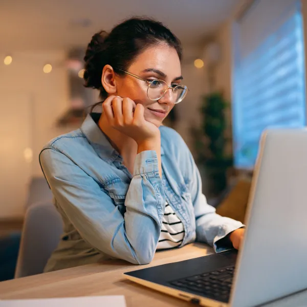 woman, using laptop, while working at home